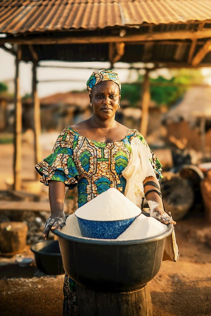 African woman entrepreneur at her market stall
